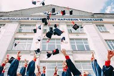 Graduates celebrating on campus